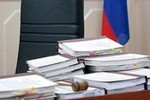 Конституционный суд РФ выяснит законность отказа в компенсации за судебную волокиту